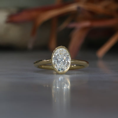 BRIDIE / 1.22ct OVAL DIAMOND BEZEL SOLITAIRE